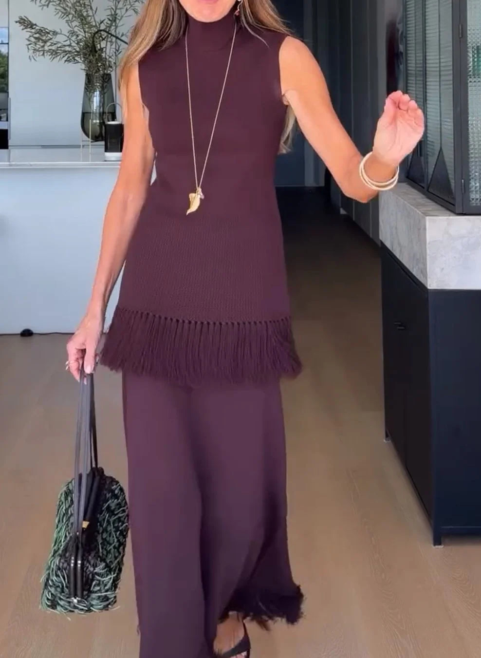 Sleeveless High Neck Fringe Trim Knit Top and Maxi Skirt Two-Piece Set [erp-image:ef3c2ef91b4ef18ca38570e9]